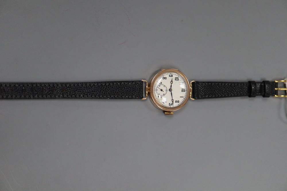 An early 20th century 9ct gold Rolex manual wind wrist watch, with Arabic dial and subsidiary seconds, (dial a.f.)